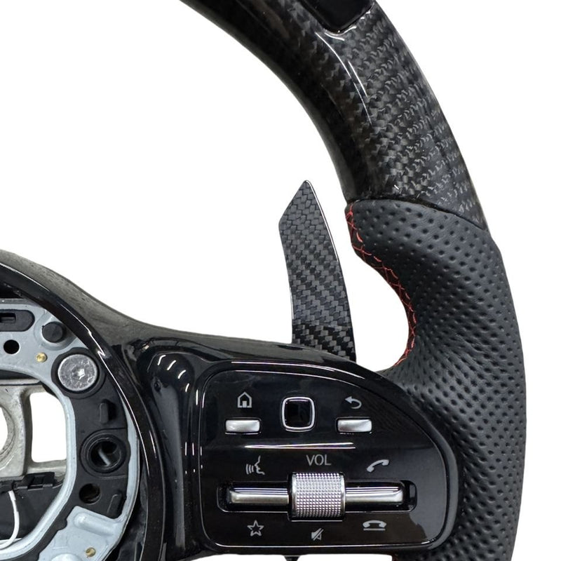 Close-up of the paddle, red stitching and button panel