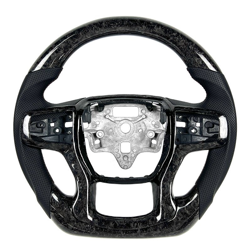 Forged carbon-pattern steering wheel for the Chevrolet Silverado with black perforated grips