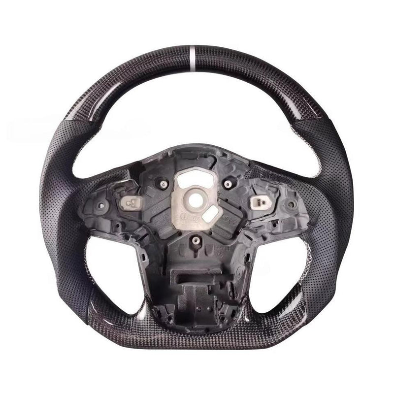 Carbon-pattern steering wheel for the Toyota GR Supra with black perforated grips